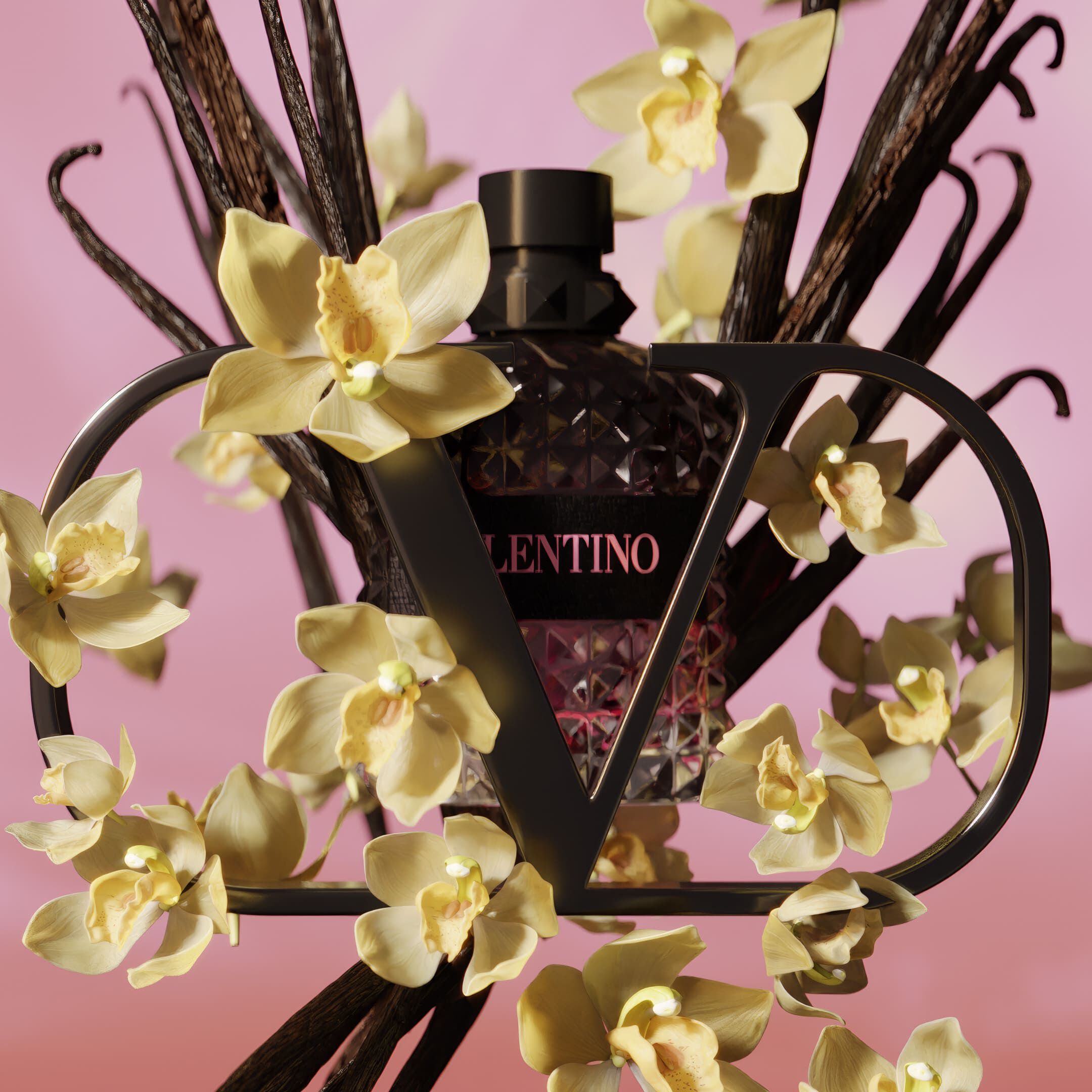 A decorative perfume bottle is surrounded by delicate yellow orchids and dark branches, set against a soft pink background. The bottle has a geometric design and features the brand name "Valentino."